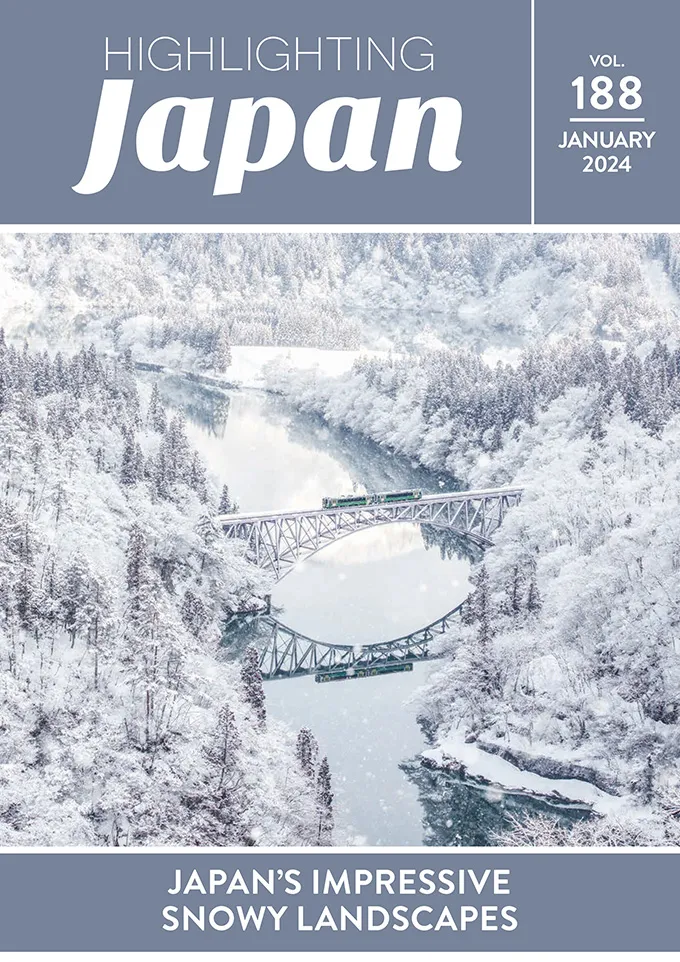 政府広報誌 Highlighting Japan 2024年1月号の表紙。雪の只見線の写真